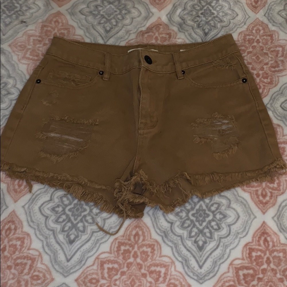 Distressed khaki shorts